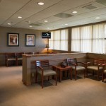 Waiting room with large windows at {PRACTICE_NAME}